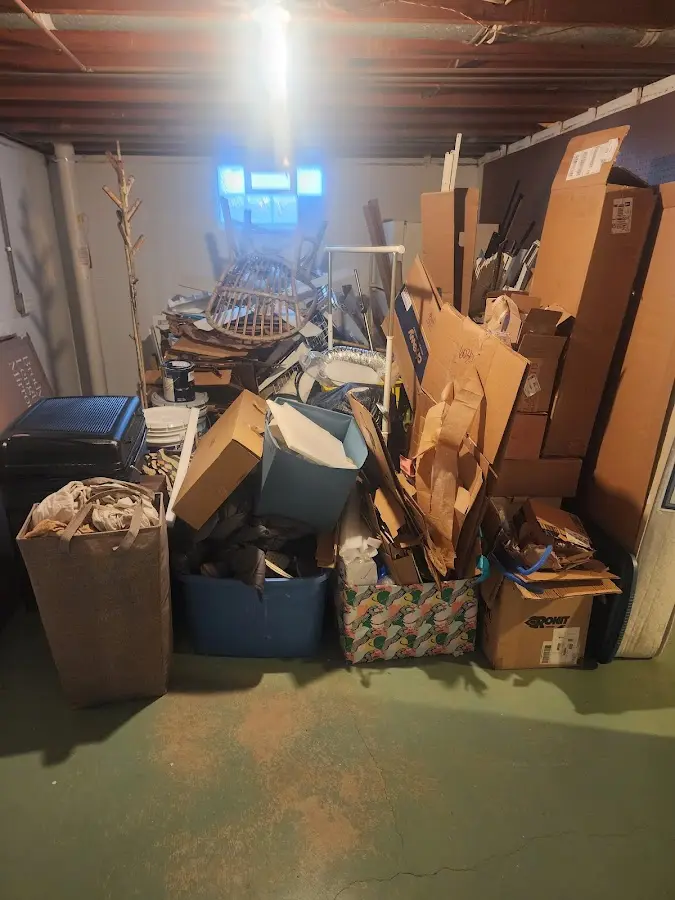 Roll-off dumpster container at job site for 15 Yard Dumpster Rental in Merrimac